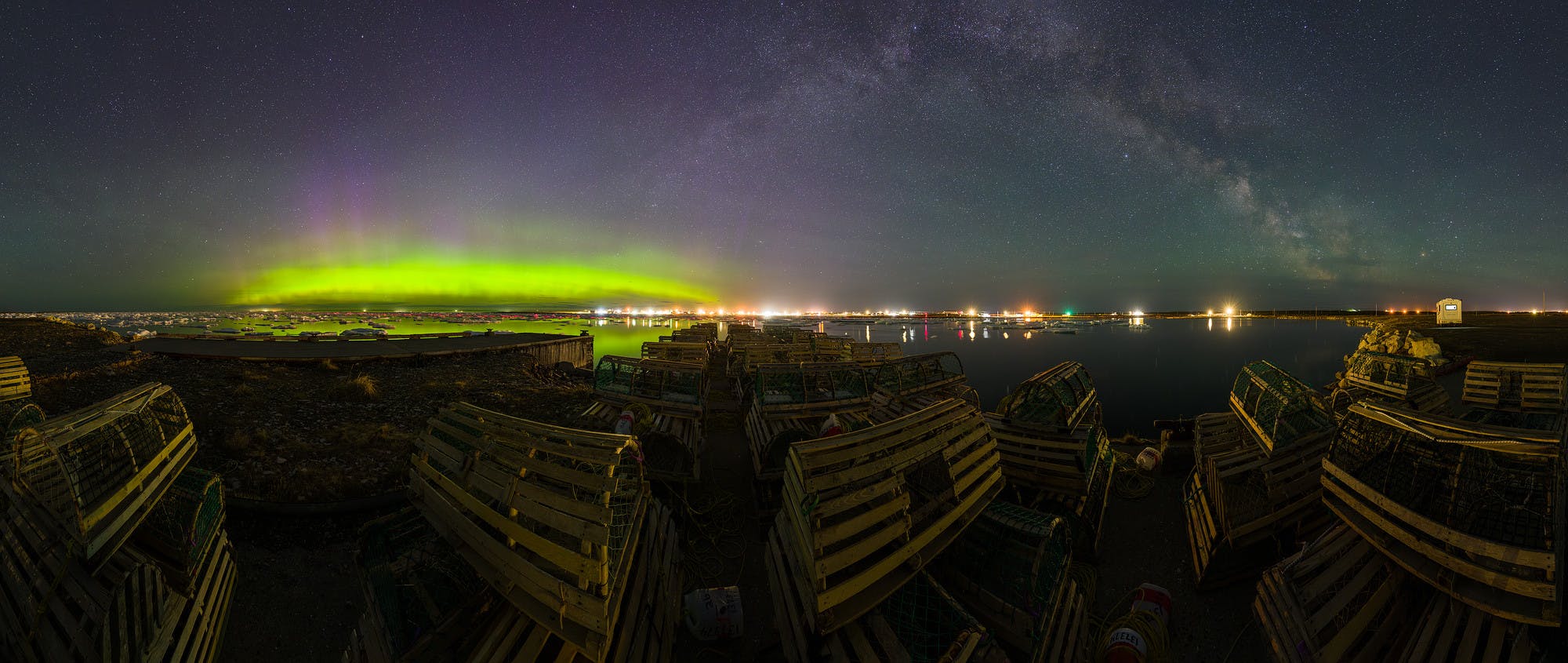 Aurora and Milky Way Over Wooden Lobster Traps